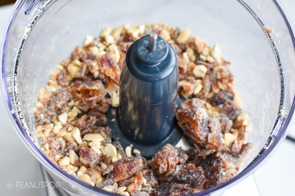 Brownie Energy Bites - Food processor step two: pulse dates and whole cashews together 